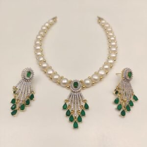 Price: 4600/- Natural fresh water pearl necklace Discover the timeless elegance of Magan Pearls' exquisite jewelry sets! 💎 ✨Each set features a stunning pearl necklace paired with matching drop earrings. 🌸 Design Variety 🔍 Quality Craftsmanship 👗 Complete Set ☎️ Contact Us: +91 9866972230 or visit us at 5-8-742/A, Ground Floor, Chapel Rd, opposite UDAI OMNI Hospital, Abids, Hyderabad, Telangana.