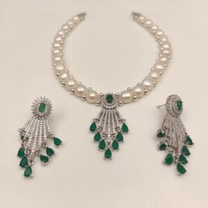 Price: 4600/- Natural fresh water pearl necklace Discover the timeless elegance of Magan Pearls' exquisite jewelry sets! Each set features a stunning pearl necklace paired with matching drop earrings. Design Variety Quality Craftsmanship Complete Set Contact Us: +91 9866972230 or visit us at 5-8-742/A, Ground Floor, Chapel Rd, opposite UDAI OMNI Hospital, Abids, Hyderabad, Telangana.