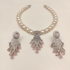 Price: 4600/- Natural fresh water pearl necklace Discover the timeless elegance of Magan Pearls' exquisite jewelry sets! Each set features a stunning pearl necklace paired with matching drop earrings. Design Variety Quality Craftsmanship Complete Set Contact Us: +91 9866972230 or visit us at 5-8-742/A, Ground Floor, Chapel Rd, opposite UDAI OMNI Hospital, Abids, Hyderabad, Telangana.