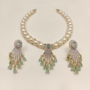 Price: 4600/- Natural fresh water pearl necklace Discover the timeless elegance of Magan Pearls' exquisite jewelry sets! Each set features a stunning pearl necklace paired with matching drop earrings. Design Variety Quality Craftsmanship Complete Set Contact Us: +91 9866972230 or visit us at 5-8-742/A, Ground Floor, Chapel Rd, opposite UDAI OMNI Hospital, Abids, Hyderabad, Telangana.