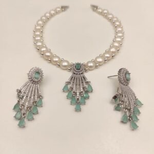 Price: 4600/- Natural fresh water pearl necklace Discover the timeless elegance of Magan Pearls' exquisite jewelry sets! Each set features a stunning pearl necklace paired with matching drop earrings. Design Variety Quality Craftsmanship Complete Set Contact Us: +91 9866972230 or visit us at 5-8-742/A, Ground Floor, Chapel Rd, opposite UDAI OMNI Hospital, Abids, Hyderabad, Telangana.
